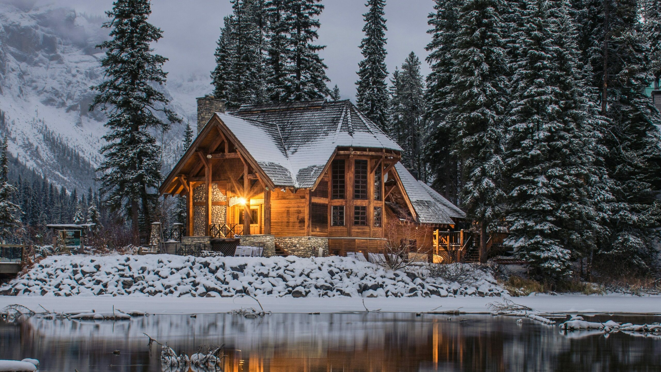 Dimly lit cabin in the wintery woods of Quebec